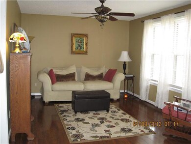 BEAUTIFUL LIVING ROOM WITH NEW HARDWOOD FLOORS AND  DOUBLE WINDOWS