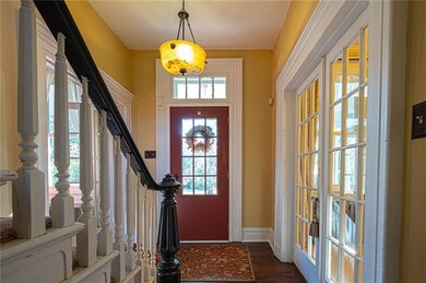 Enter from the Front door to the OPEN STAIRCASE.. 
