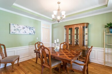 Formal Dining room with tray ceilings