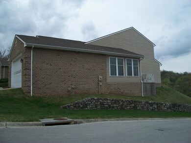 Side View w/Sunroom & Patio