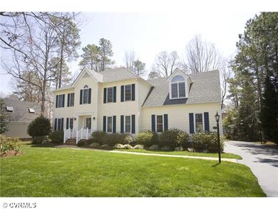 Exterior Front - Recently sealed driveway with 2-c