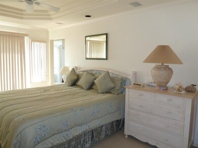 Master bedroom with private deck and panoramic lak