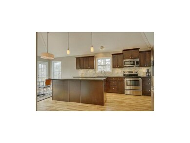 STUNNING NEW KITCHEN with decorative lighting, a c