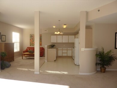 VIEW FROM LIVING ROOM LEADING INTO FAMILY ROOM AND