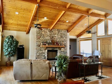 Great room with wood vaulted ceiling