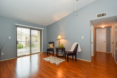 Upon entry you are greeted with the living room ar