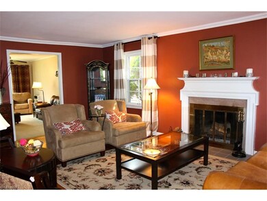 Striking living room with marble surround fireplac