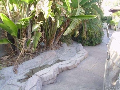 River leading into pool/spa.