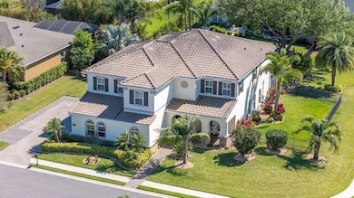 Aerial view featuring an Oversized corner lot, and dog run. Situated on a very quiet street, with no neighbor to the west.