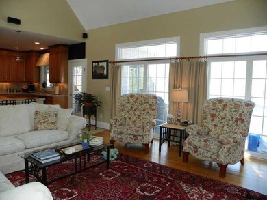Living Room. Vaulted ceiling,...