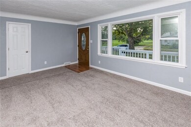 Nice living room space with coat closet off the fr