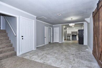 Open Kitchen & Dining Space and 1 staircase to the