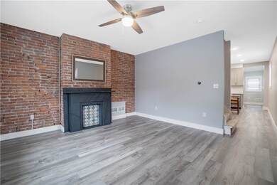 Living room, restored fireplace, nest thermostat,