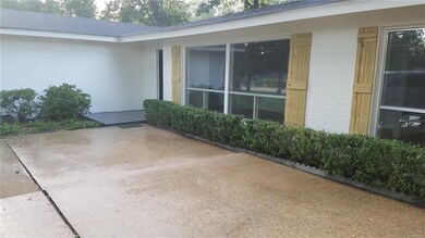 Beautiful landscaping and a NEWLY tiled front entr