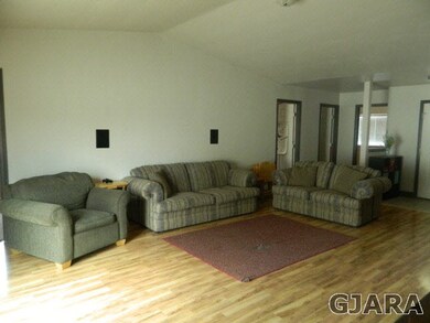 Spacious Living room with new laminate flooring.