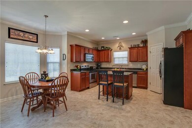 Living Room is open to kitchen and large eat-in area with bay window. 