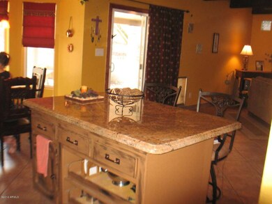 ISLAND KITCHEN OPENING TO GREAT ROOM