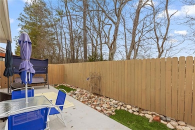 View of patio / terrace with a fenced backyard and
