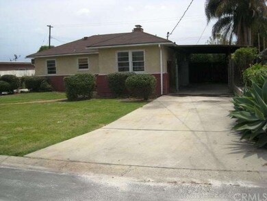 Front yard with carport