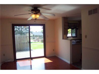Dining Room. New laminate wood flooring.  Sliding 