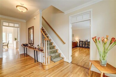 Hardwood in foyer, living room, dining room and ki