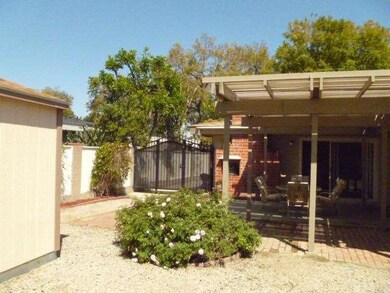 LOW MAINTENANCE YARD, BRICK AND CONCRETE PATIO WIT