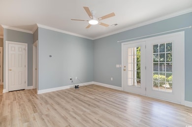 Spare room with light hardwood / wood-style floors