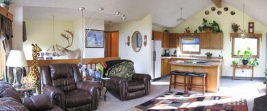 Open living room with vaulted ceilings