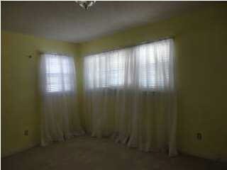 Bedroom #1, lots of light with the windows. Carpet