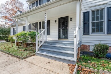Property entrance with covered porch