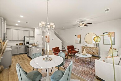 Dining area with sink, ceiling fan with notable ch