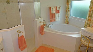 master bath with soaking tub, separate shower and 