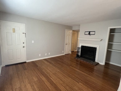 TV bracket and HDMI cables remain. Bookshelves provide great storage.