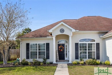 As you approach the home, be greeted by a grassy f