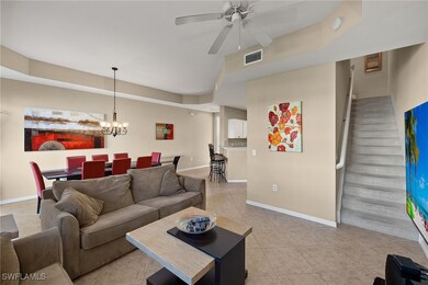 Living room featuring light tile patterned floorin