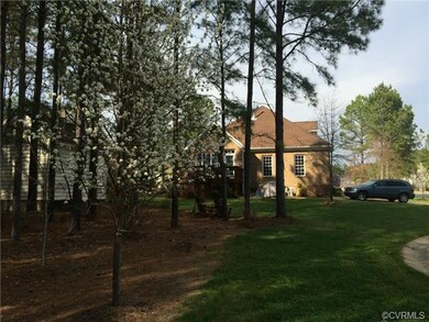 Terrific oversized lot with natural landscaped rea