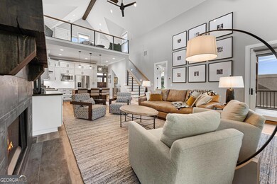 Large family room with beamed ceiling