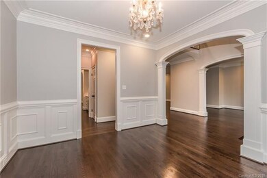 View from dining room into kitchen and foyer areas