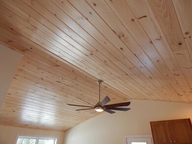 open living area, pine cceiling