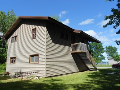 from back showing lake and stairs