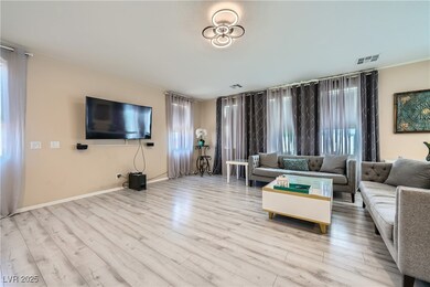 Living area featuring wood finished floors and bas
