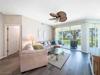 Living room with wood finished floors and a ceilin