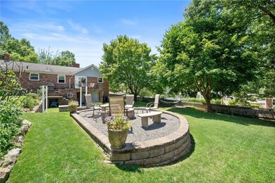 Outdoor living space with firepit!