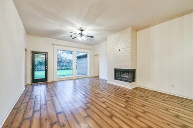 Spend countless hours relaxing in the Family Room which boasts a fireplace surrounded with decorative paneling. Wood/glass door leads to the backyard patio, the door to the left leads to the Owner’s Retreat and the doorway to the right goes to a hallway to the secondary bedrooms, bathroom, laundry room and entry to the garage.