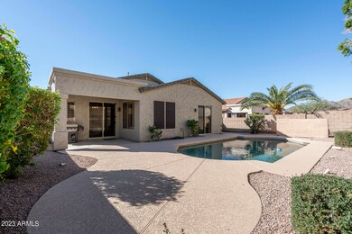 Pebble-Tec Pool & Lounging Area