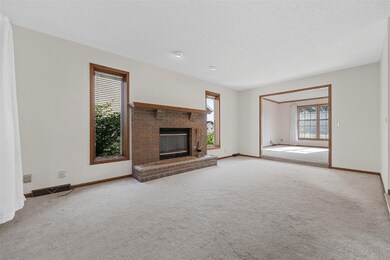 Spacious Family Room with gas fireplace.