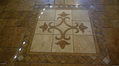 Tumbled travertine with inlay pattern
