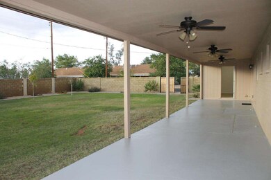 FULL COVERED PATIO & HUGE BACKYARD