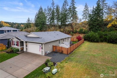 So much privacy with this 1874 sq. ft. home built in 2020. Green belt in back and open lot next door will never be built on as it serves as part of the communities drainfield.