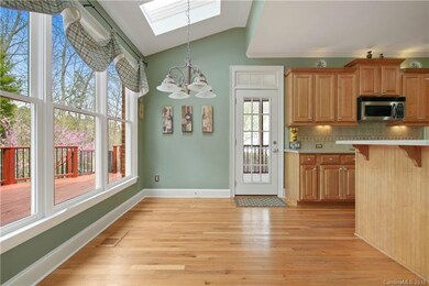 Breakfast Room with view out to the deck and priva